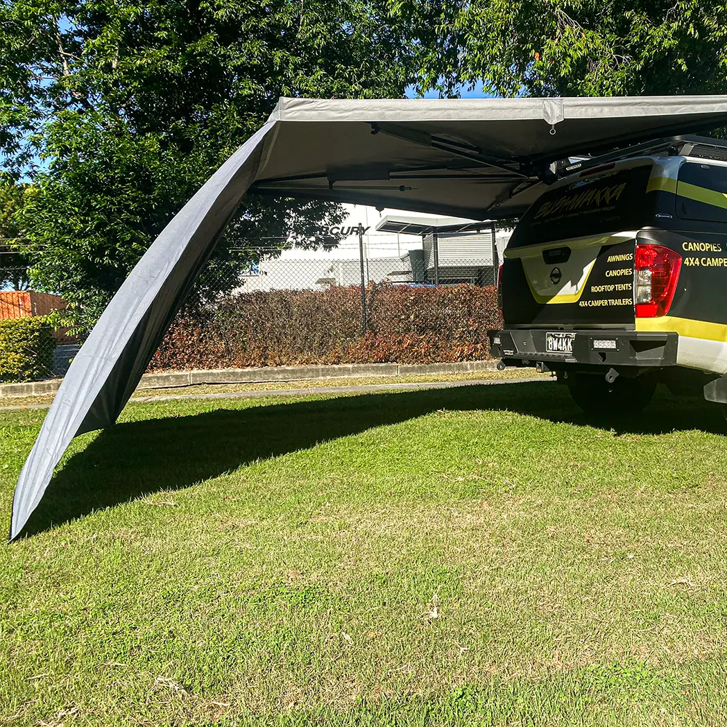 Bushwakka Extreme 180 degree awning wall rear view with the sloping panel beside the tailgate of a 4WD.