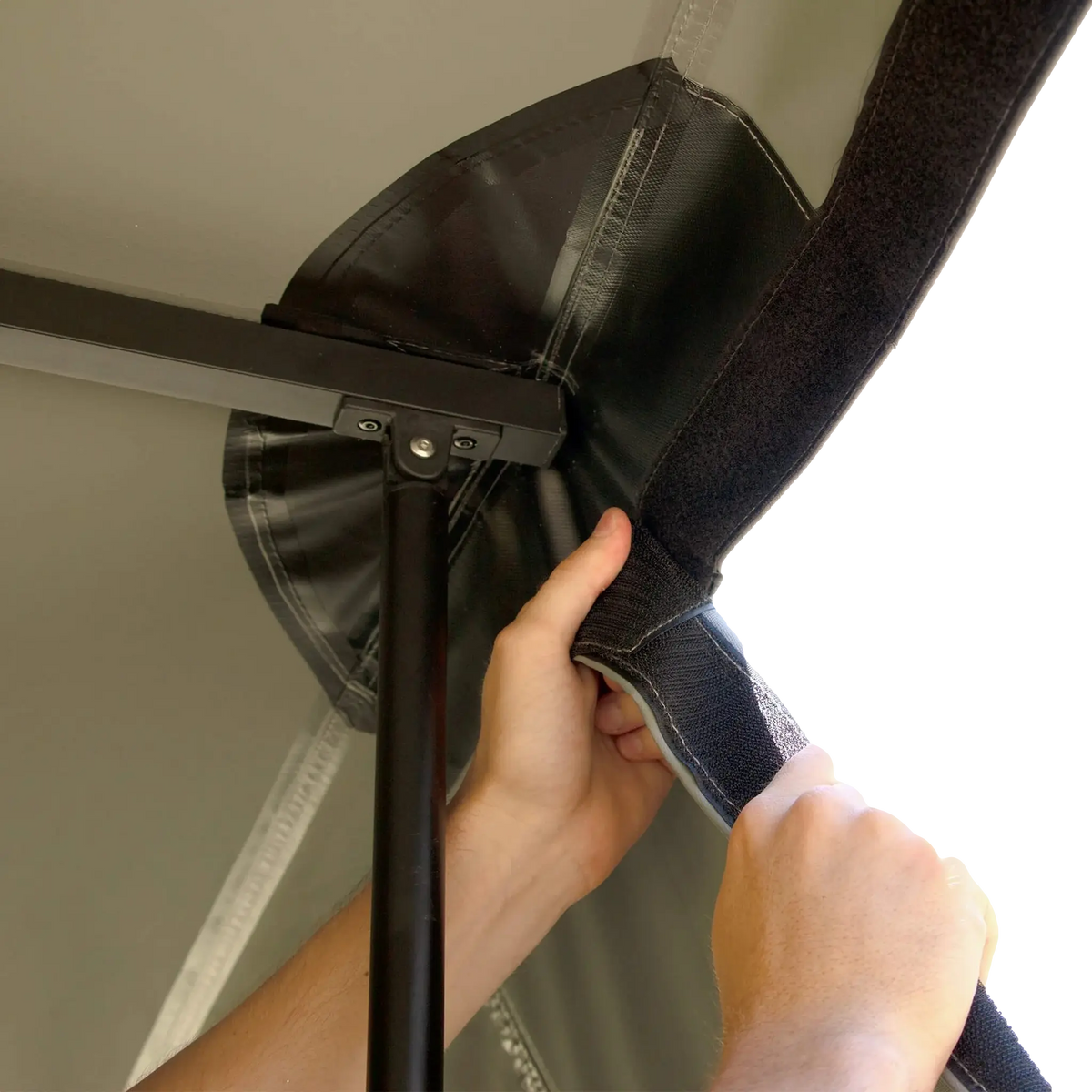 Bushwakka Extreme 270 awning wall kit hook-and-loop attachment around the awning arm.
