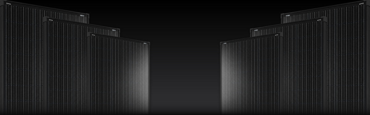 Rows of black glass slimline solar panels