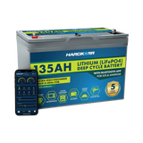 Hardkorr 135Ah 12V lithium battery beside a phone displaying the Bluetooth monitoring app.
