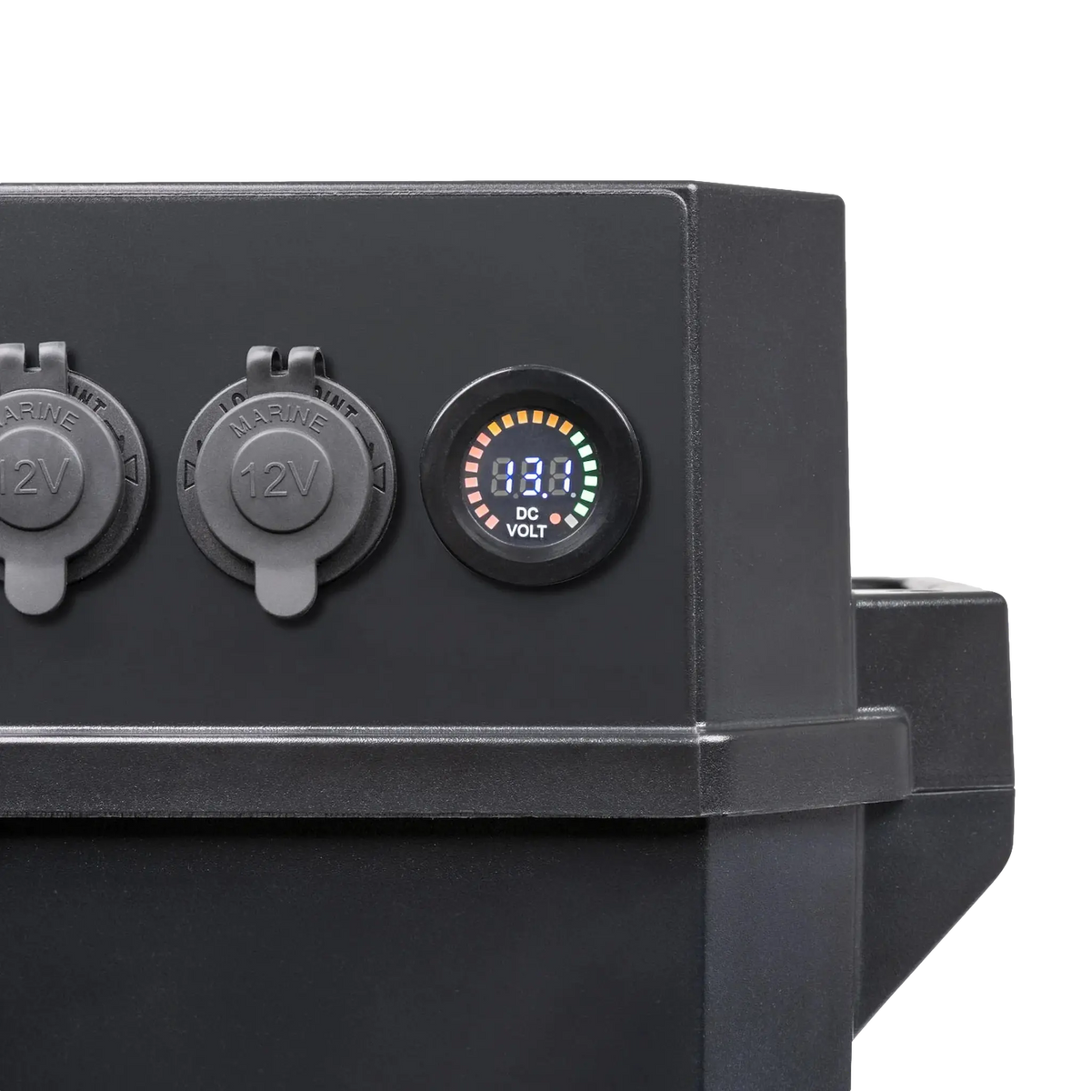 Hardkorr Battery Box Pro voltmeter dial and covered cigarette socket close-up.