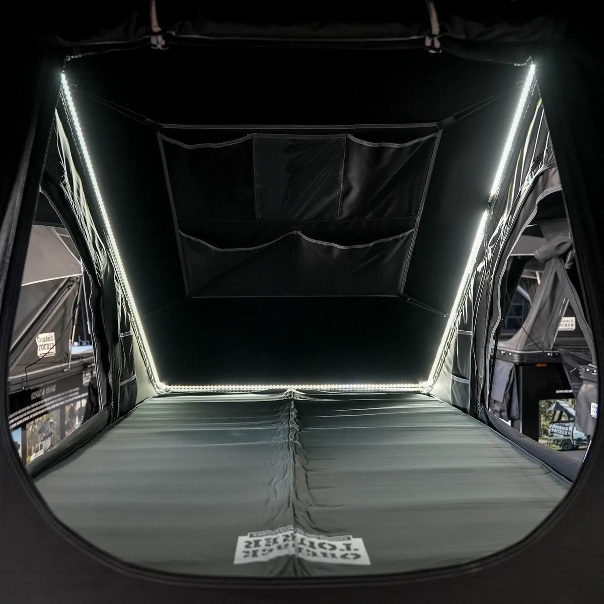 Outback Tourer 1.2 Carbon Fibre Rooftop Tent interior light strips around the bed area.