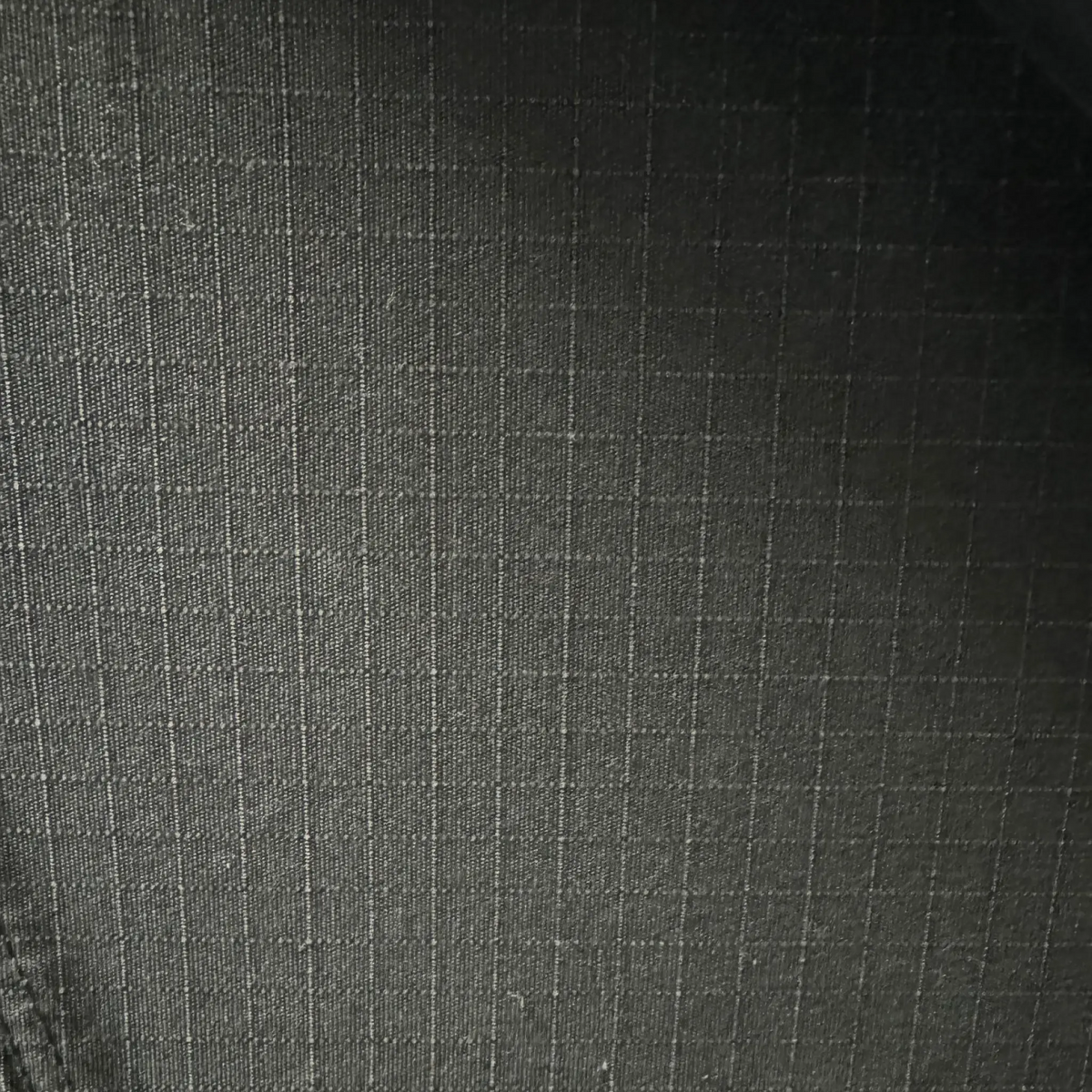 Outback Tourer 1.2 X Plus Rooftop Tent black canvas fabric texture detail.