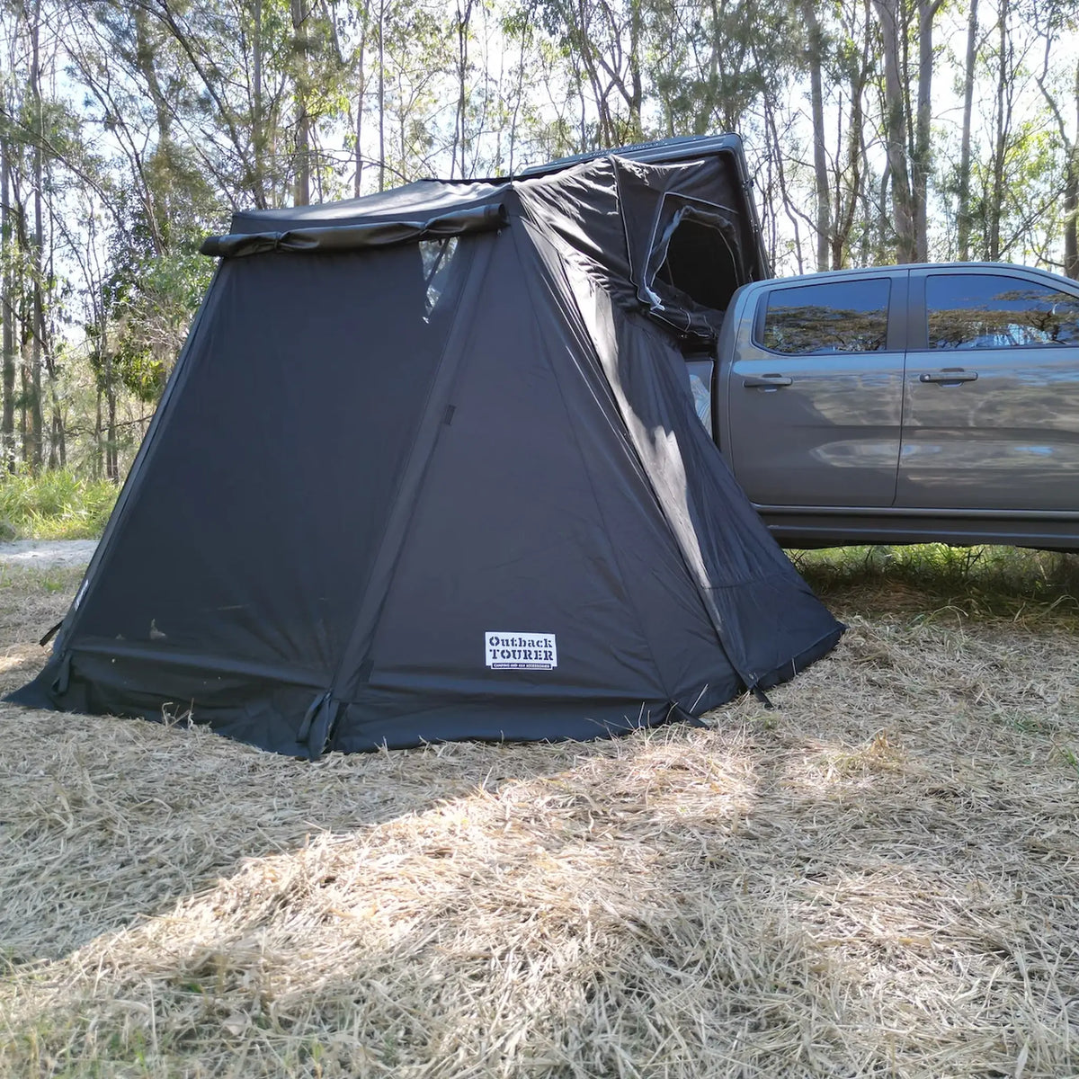 Outback Tourer 1.5 Lite Annex closed right-side view attached to a ute.