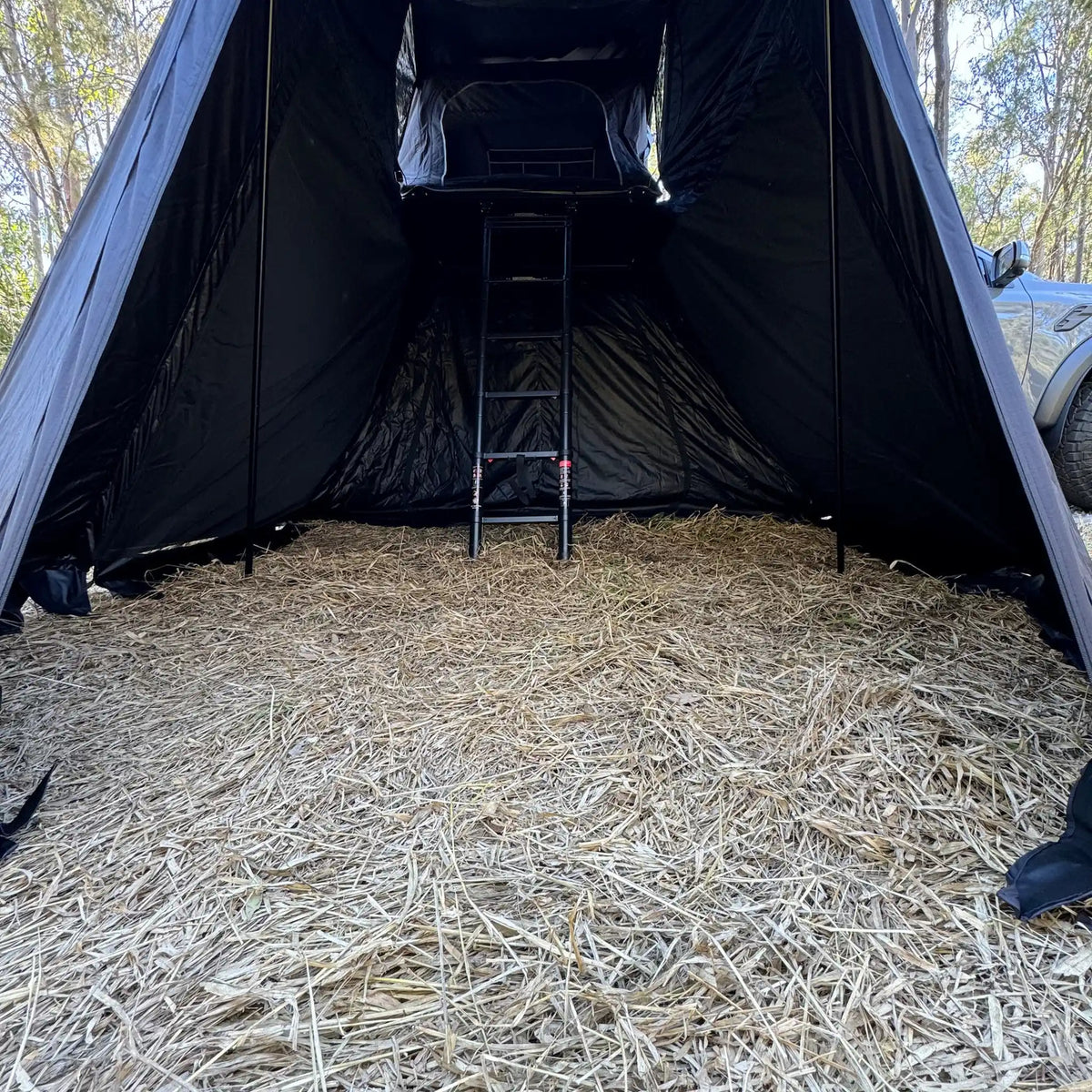 Outback Tourer 1.5 Pro Annex interior view with ladder leading to the rooftop tent.