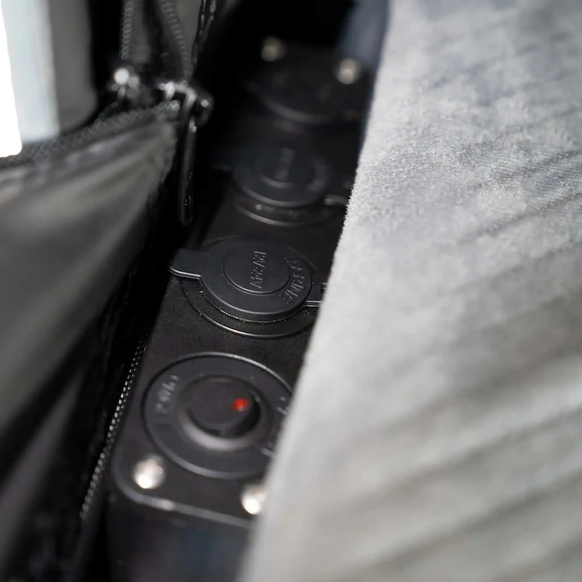 Outback Tourer 1250 Z Rooftop Tent interior power panel beside the mattress.