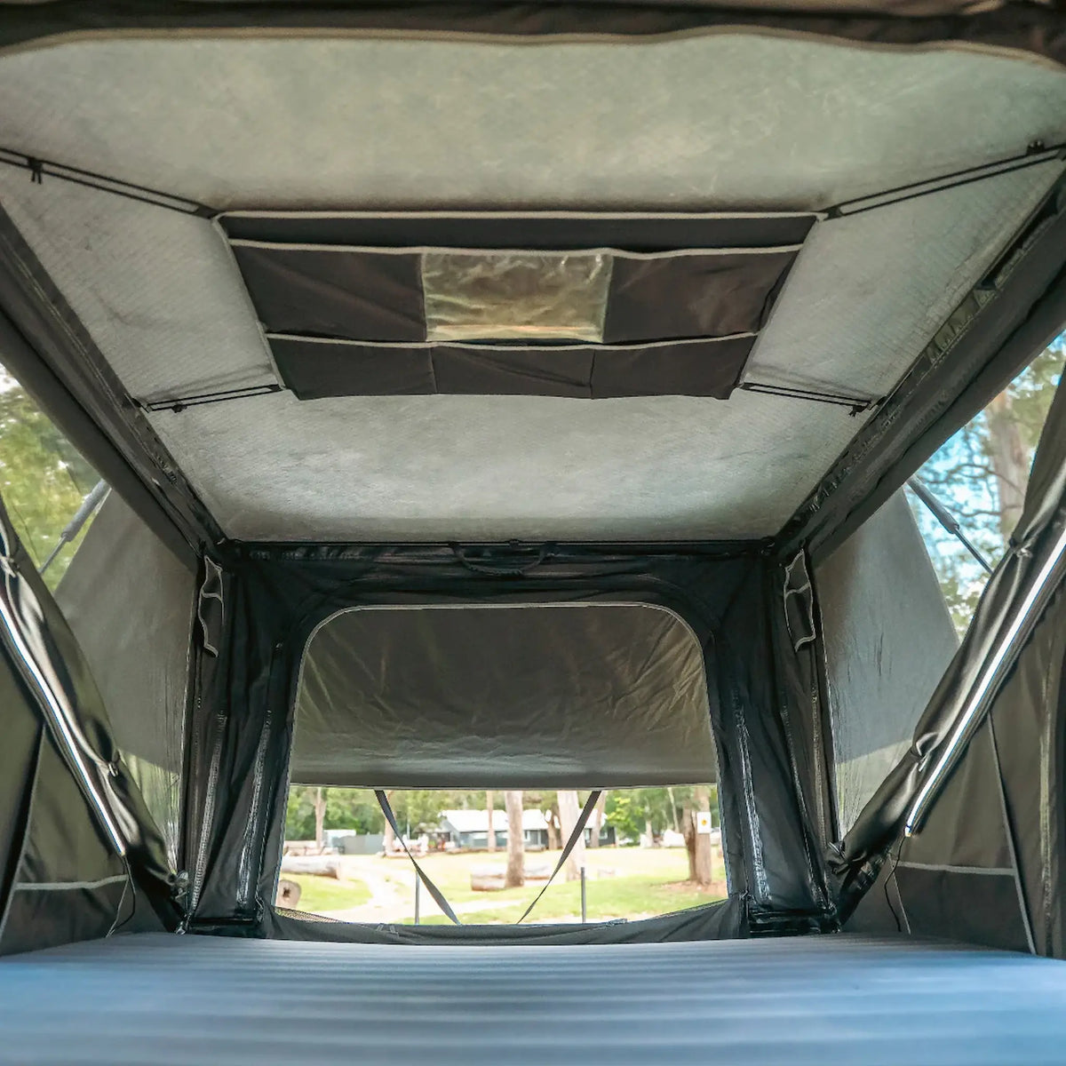 Outback Tourer 1550 Z Rooftop Tent interior organiser pocket above the mattress.