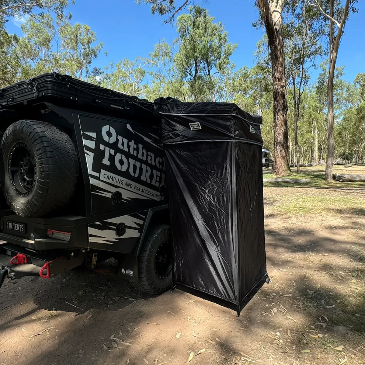 Outback Tourer Shower Awning front right view beside the vehicle.