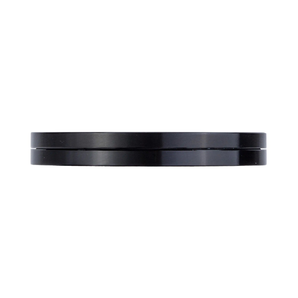 Rekcharge 12V black warm white LED downlight side view of its thin black housing.