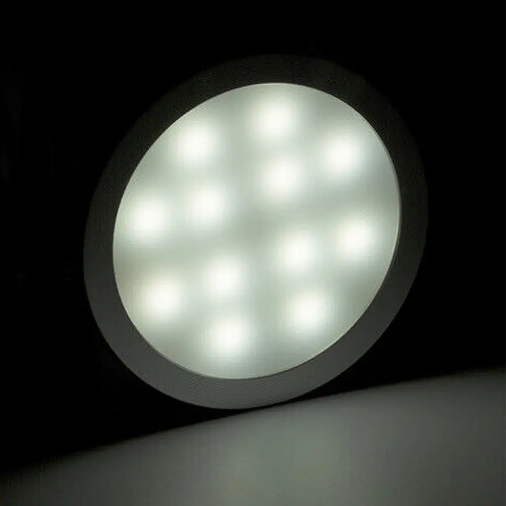 Rekcharge 12V silver cool white LED downlight illuminated with individual LED points visible through the diffuser.