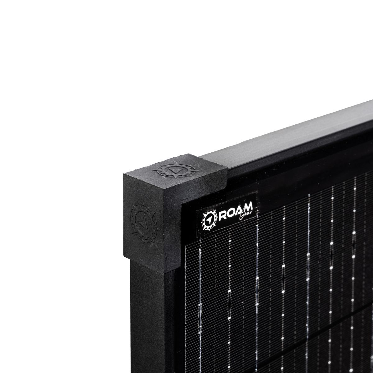 Roam Gear 160W 12V slimline black glass solar panel corner close up showing the corner cap and logo beside the cells.