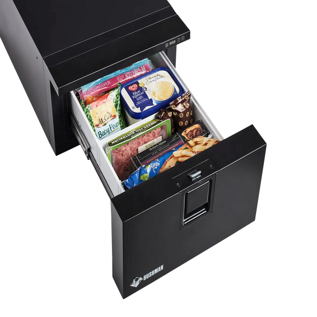 Bushman DF30-HD drawer fridge freezer front-left view with drawer open and food inside.