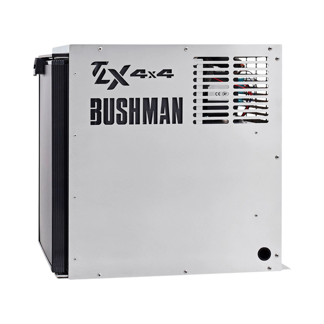 Bushman 65L aluminium fridge box right side view with vent slots and cutout logos beside a black fridge door.