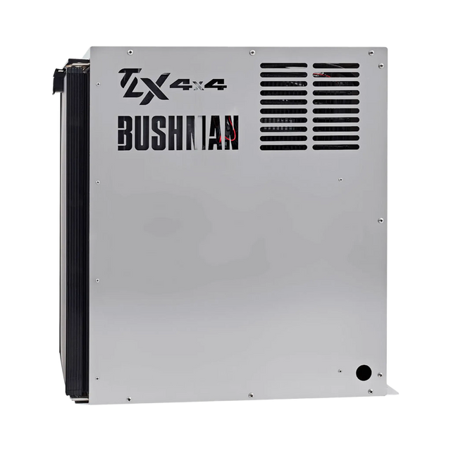 Bushman 85L aluminium fridge box right side view with vent slots and cutout logos beside a black fridge door.