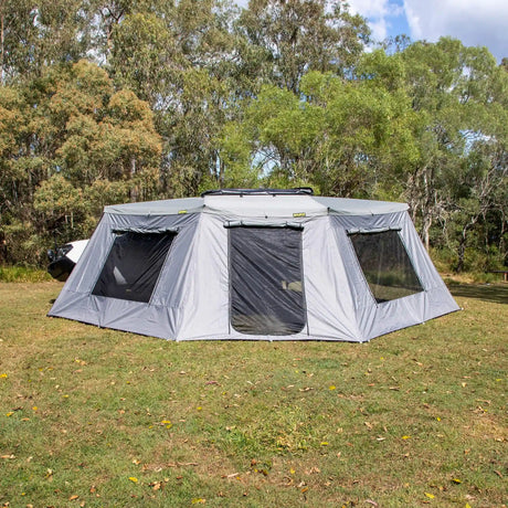 Bushwakka Extreme 180 awning wall kit rear installed view with doorway and windows open.