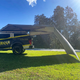 Bushwakka Extreme 180 degree awning wall installed side view beside a 4WD with the shaded area beneath visible.