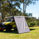 Bushwakka Extreme 2000 mm straight wall front-left installed view beneath a vehicle awning.