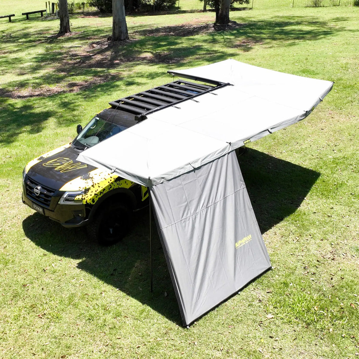 Bushwakka Extreme 2500 mm straight wall overhead left view installed on a vehicle awning.