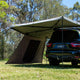 Bushwakka Extreme 270 awning single door wall rear view beside the back of the vehicle.