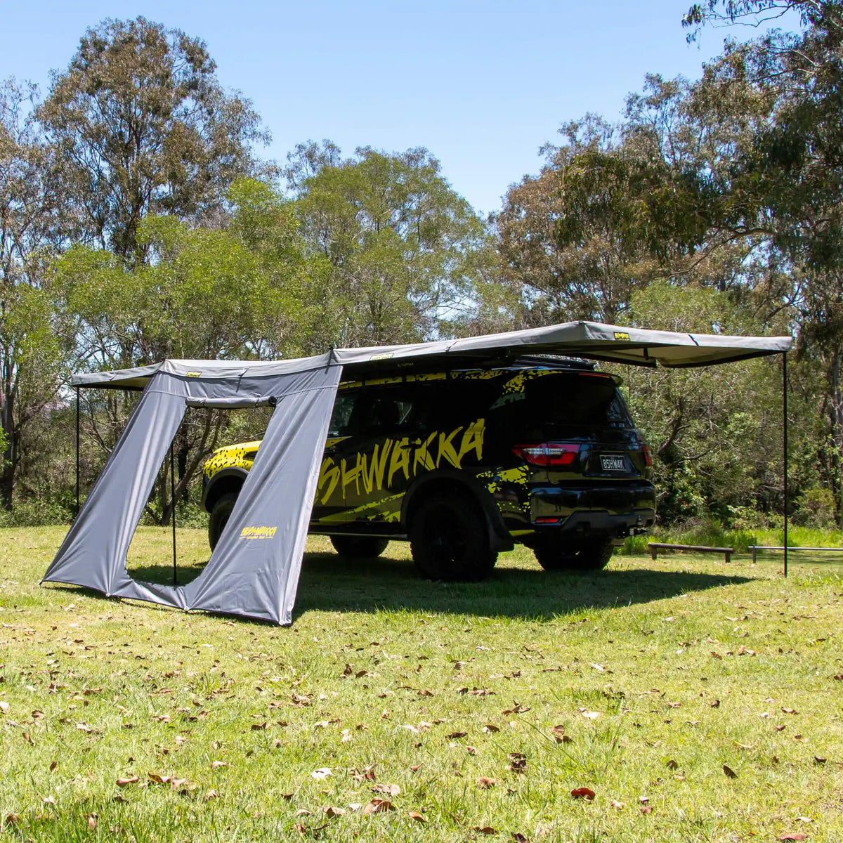 Bushwakka Extreme 270 awning single door wall front installed view with the doorway open.