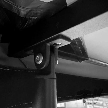 Bushwakka Extreme awning bow-end leg installed at the pivot bracket beneath the awning frame.