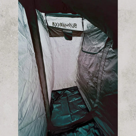 Bushwakka Extreme Shower Ensuite Double interior cubicle with floor panel and wall storage pocket.
