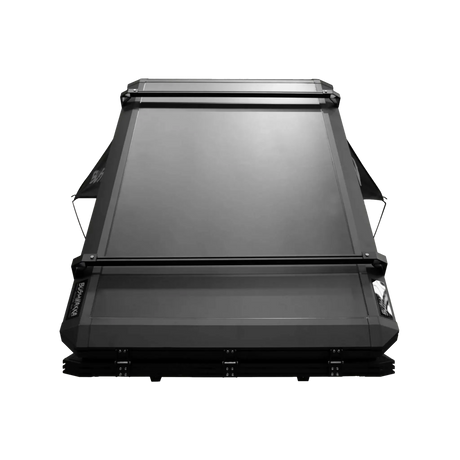 Bushwakka Nomad rooftop tent front view with raised aluminium shell.