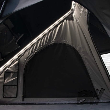 Bushwakka Nomad rooftop tent interior side doorway with LED strip lighting.