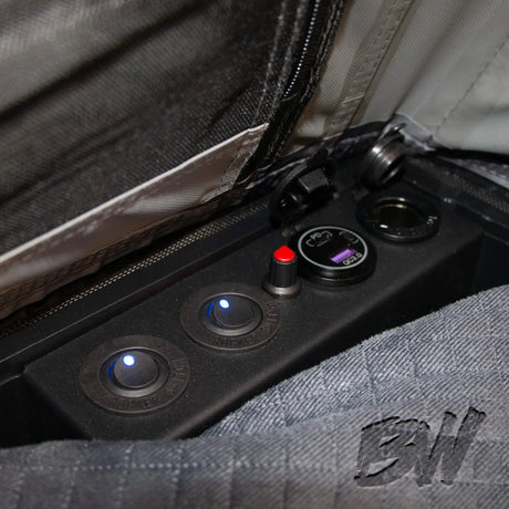 Bushwakka Nomad rooftop tent power controls and charging ports close up.