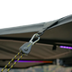 Bushwakka Passenger Side 270 Pro Awning tie-down strap and hook attached to the awning edge.