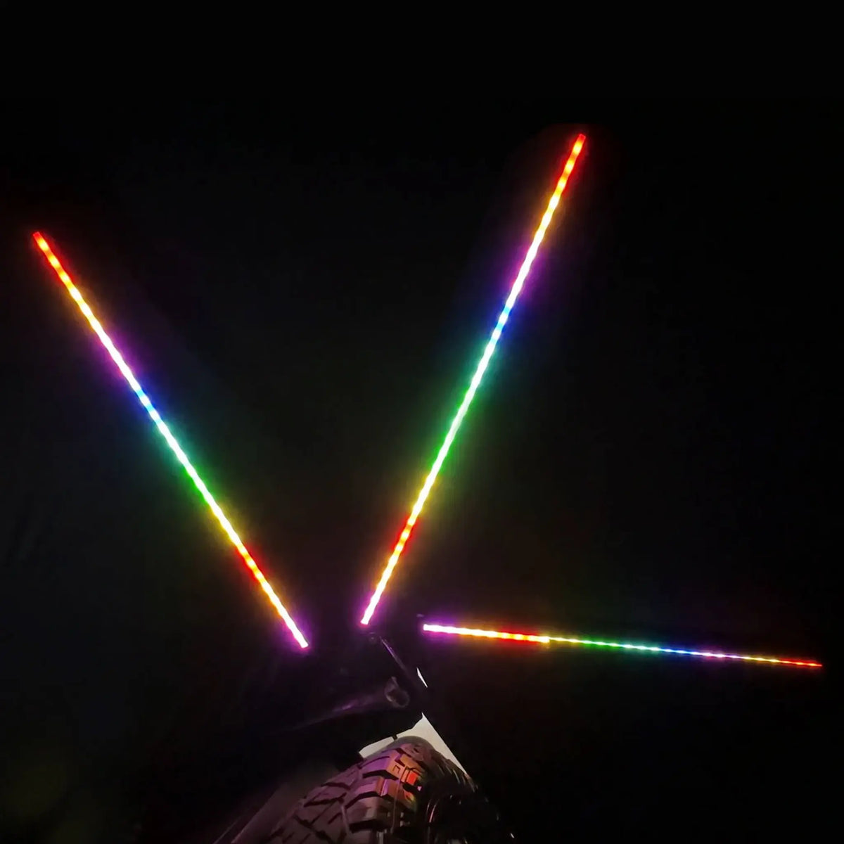 Bushwakka Passenger Side Darkness 270 Pro Awning night view with RGB light strips turned on.