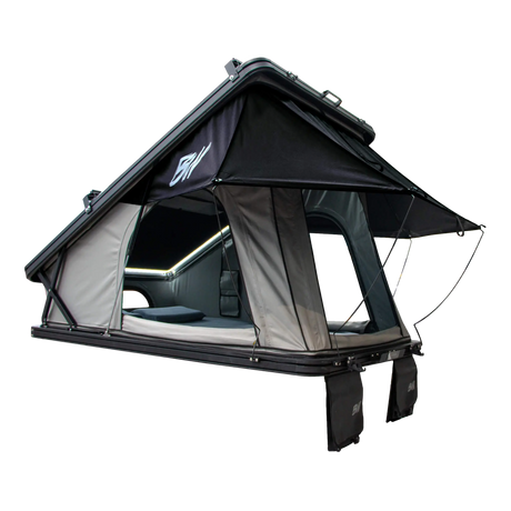 Bushwakka Shack rooftop tent rear angled view with open doors, rain fly on steel poles and hanging shoe bags.