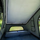 Bushwakka Stellar rooftop tent interior with the roof cover closed and a light strip along the frame.