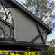Bushwakka Stellar rooftop tent side close up of crossed support arms beneath the raised roof.