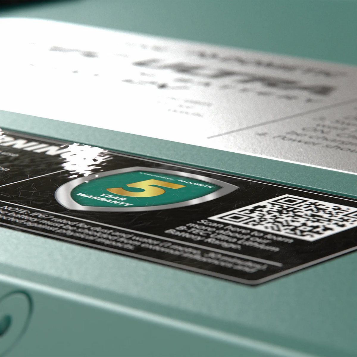 Enerdrive 300Ah 12V B-TEC ULTRA G3 lithium battery close up of the five year warranty label and QR code.