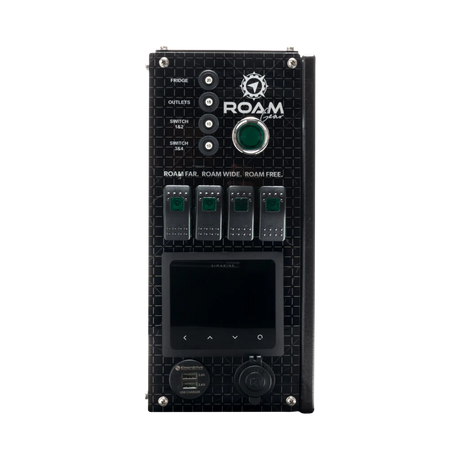 Enerdrive driver side Traveller 03 control panel with a blank monitor, unlit switches and covered 12V socket.