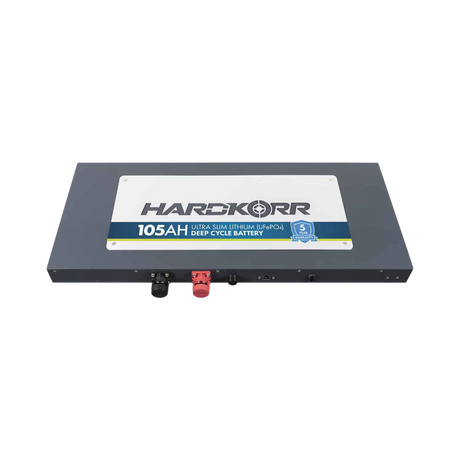 Hardkorr 105Ah 12V slimline lithium battery front right view with lower connection ports visible.