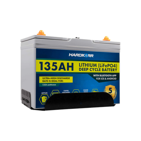 Hardkorr 135Ah lithium battery fitted in the tray with the front retaining panel visible.