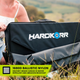Hardkorr 150W 12V portable solar mat carry bag open in grass with the folded mat visible inside.