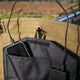 Hardkorr 15W dual USB solar device charger v2 pocket close up with a phone and USB cable connections.