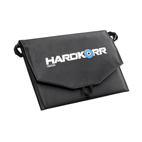 Hardkorr 15W dual USB solar device charger v2 folded into its black pouch in an angled view.