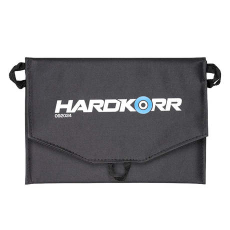 Hardkorr 15W dual USB solar device charger v2 folded closed in a straight view with its branded flap and hanging loops.