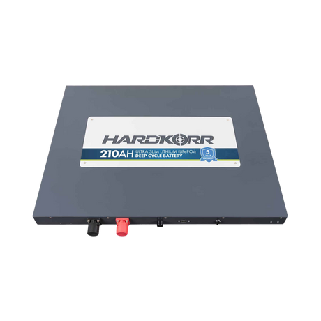 Hardkorr 210Ah 12V slimline lithium battery lying flat with its front label facing upwards.