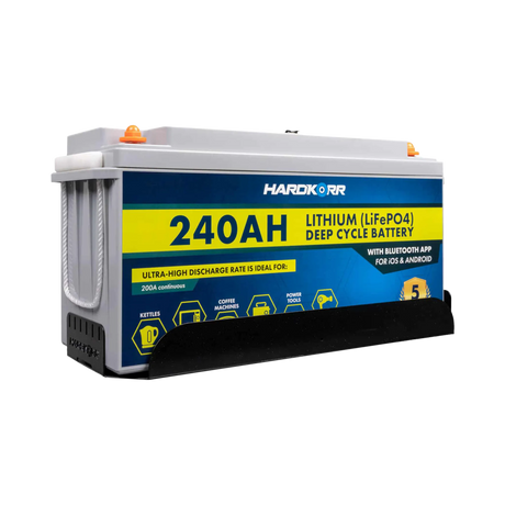 Hardkorr 240Ah lithium battery fitted in the tray with the front retaining panel visible.