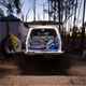 Hardkorr 2m LED tape light illuminating a vehicle's open rear cargo area with white light at dusk.