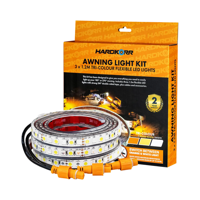 Hardkorr 3 strip LED awning light kit with coiled light strips and orange connectors beside the packaging.