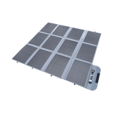 Hardkorr 300W 12V portable solar blanket unfolded with solar cells and a grey fabric border.