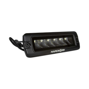Hardkorr 30W XDW flush mount LED work light front angled view with a clear lens and mounting holes in the bezel.