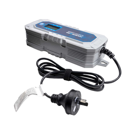 Hardkorr 6A 240V AC battery charger angled beside its coiled power cord and Australian plug.