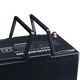 Hardkorr Black 100Ah 12V lithium battery close up of raised carry handles and positive terminal.